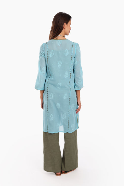 Embroidery tunic with contrast color piping in printed cotton voile
